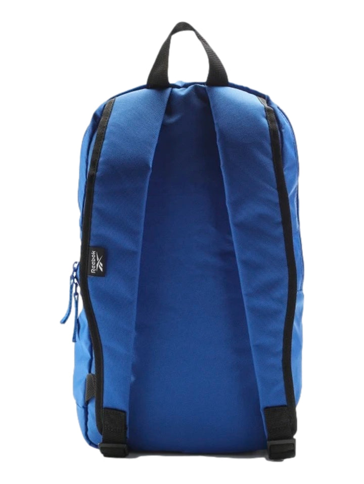 Mochila escolar Reebok azul para niños con bolsillo frontal de malla negra y logotipo rojo.
