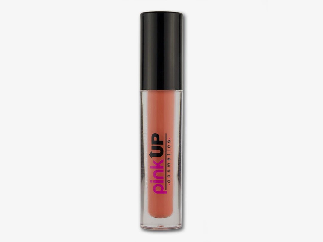Corrector de maquillaje PINK UP en tubo transparente con tapa negra y contenido color naranja.