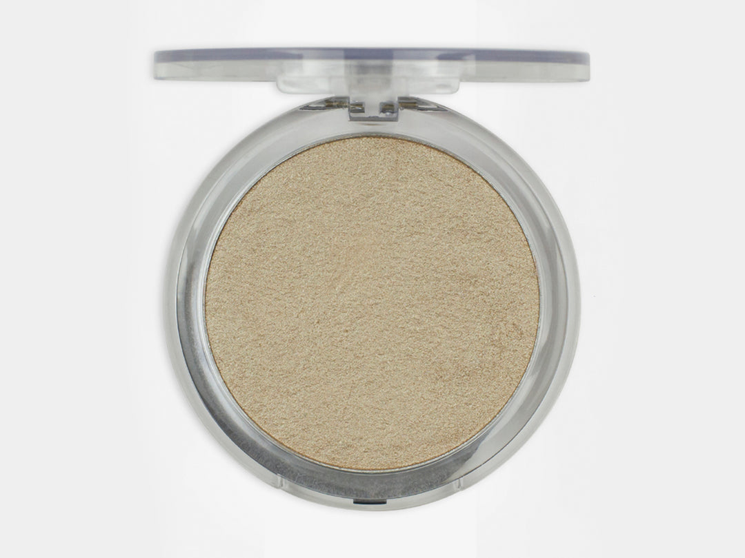 Iluminador Pink Up Sun tono Brillance, polvo compacto circular en estuche transparente.