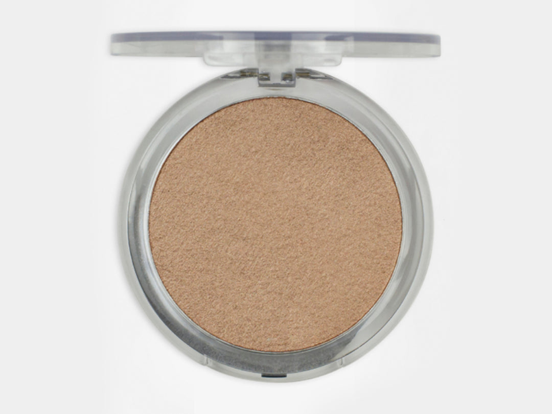 Iluminador Pink Up Sun tono Shine, polvo compacto circular en estuche transparente.