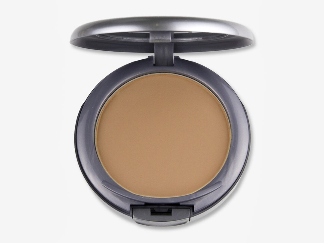 Polvo compacto de maquillaje Pink Up Mineral Cover color Tanning en estuche circular gris.