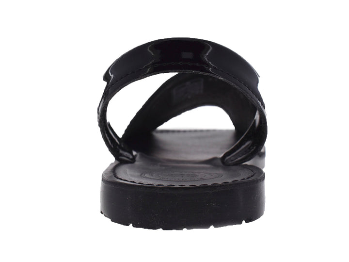 Sandalias negras de charol brillante con correa trasera para Niña.