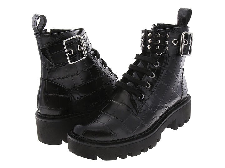 Botas combat negras para mujer con textura de cocodrilo, suela track y detalles metálicos en plata.