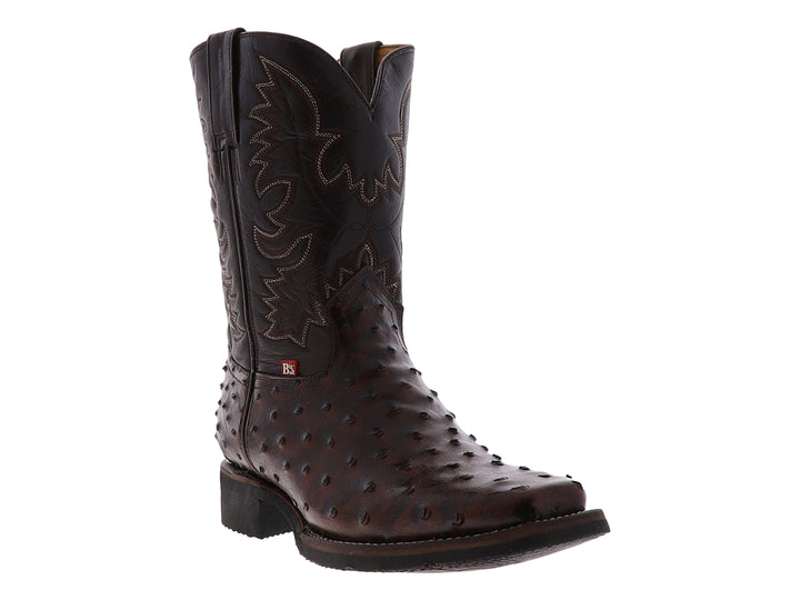 Bota vaquera de piel de avestruz color chocolate con bordados decorativos y suela negra.