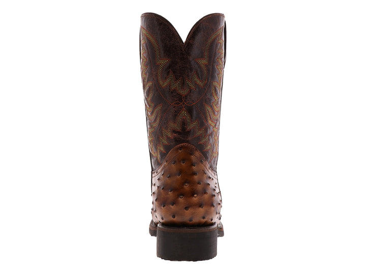 Botas vaqueras para hombre en cuero de avestruz color brandy con bordados decorativos en la caña.
