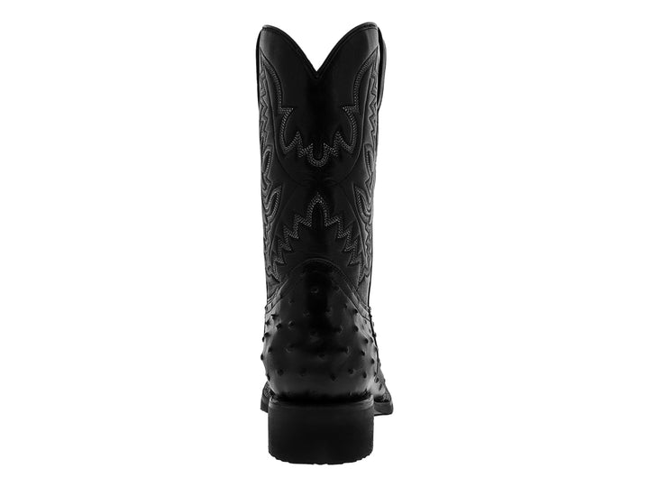 Bota vaquera de cuero de avestruz color negro con suela de hule y detalles bordados.