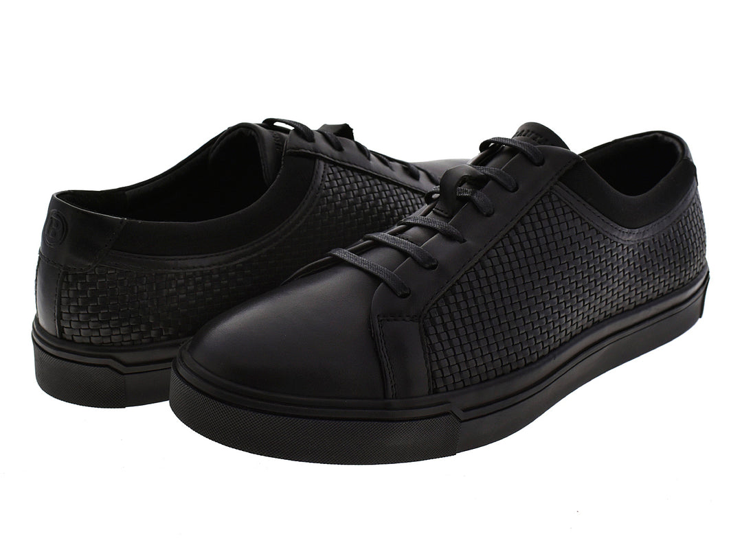 Par de tenis negros Brantano Stark para hombre con detalle tejido en los laterales y suela plana.