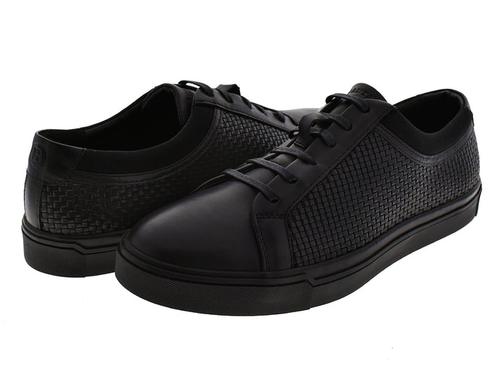 Par de tenis negros Brantano Stark para hombre con detalle tejido en los laterales y suela plana.