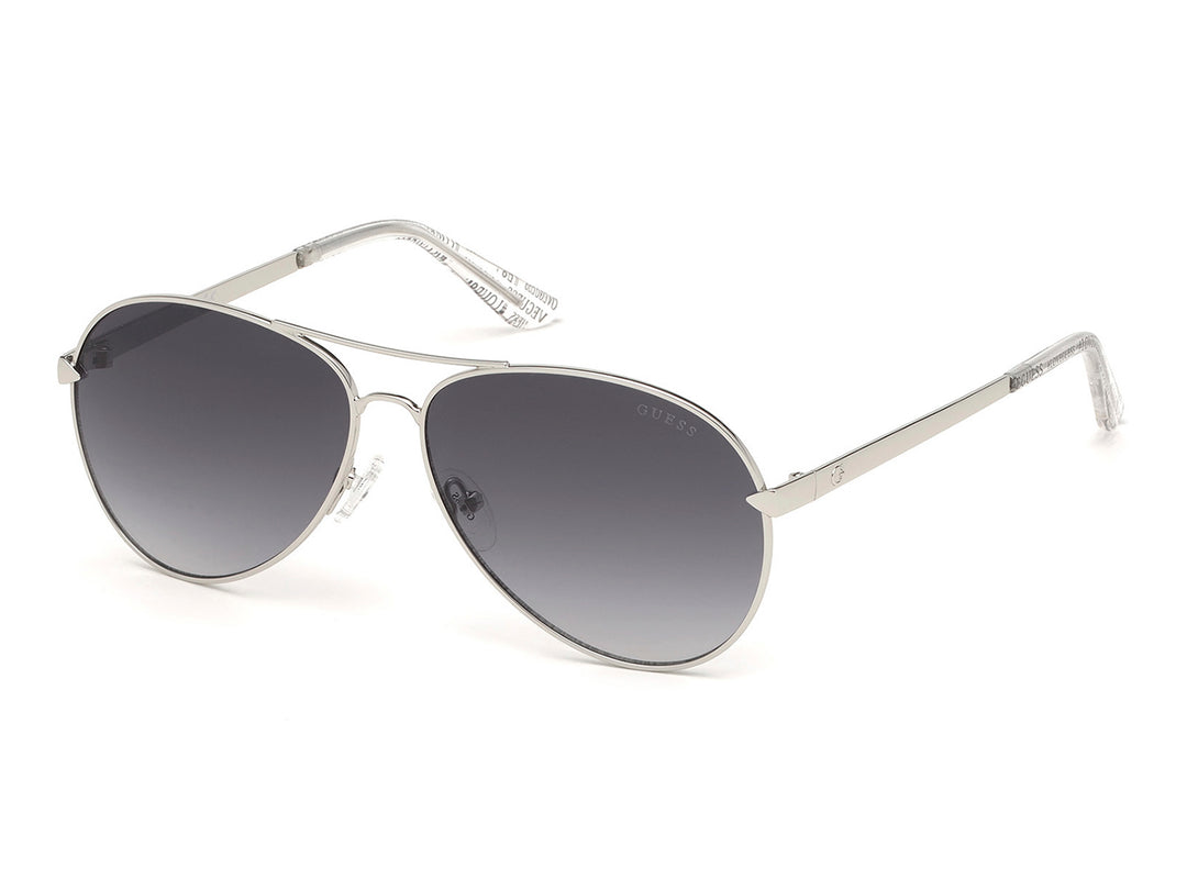 Lentes de sol Guess para mujer con armazón metálico color plata y cristales degradados en tono gris.