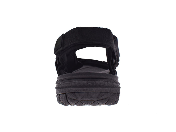 Sandalia deportiva negra estilo gladiador con correas ajustables y suela ergonómica.