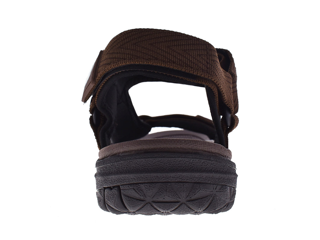 Par de sandalias estilo gladiador color marrón con correas ajustables y suela gruesa.