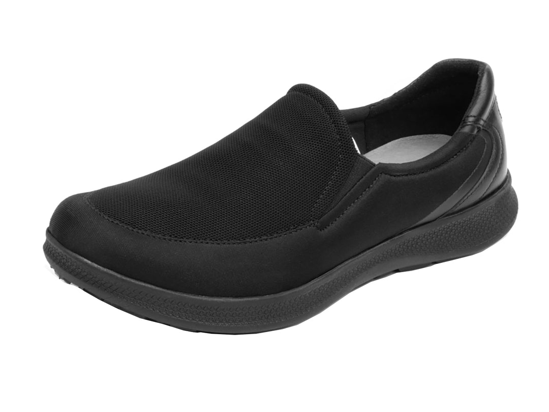 Zapato plano Flexi Helga para mujer en color negro, estilo slip-on con detalles de malla y suela cómoda.