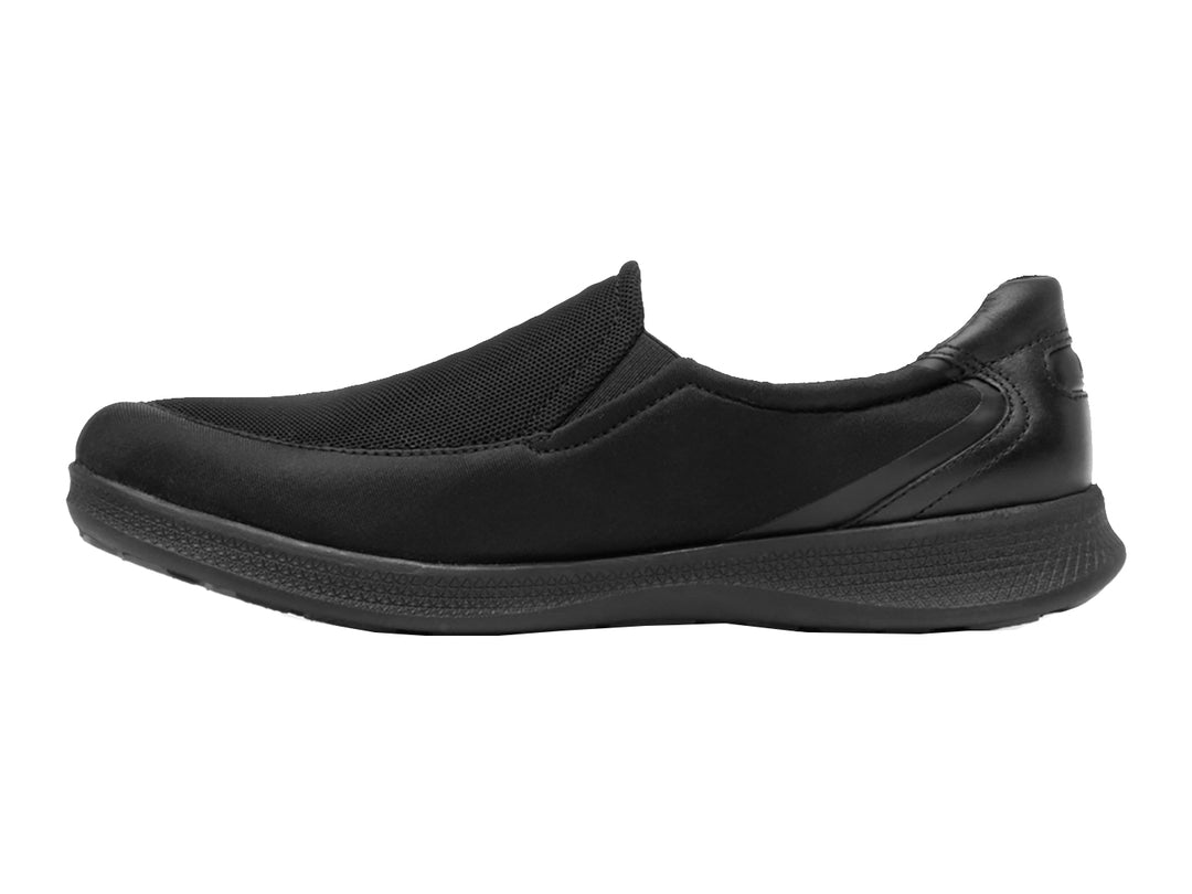 Zapato plano Flexi Helga para mujer en color negro, estilo slip-on con detalles de malla y suela cómoda.