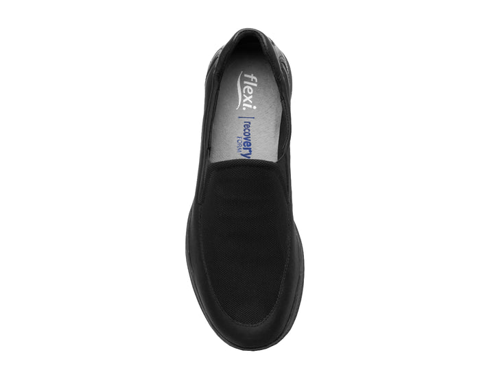 Zapato plano Flexi Helga para mujer en color negro, estilo slip-on con detalles de malla y suela cómoda.