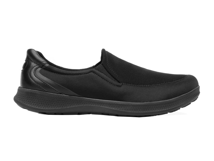 Zapato plano Flexi Helga para mujer en color negro, estilo slip-on con detalles de malla y suela cómoda.