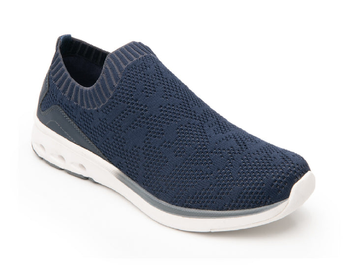 Zapato Flexi Fenix para mujer en color azul marino con suela blanca, diseño slip-on de tejido flexible.
