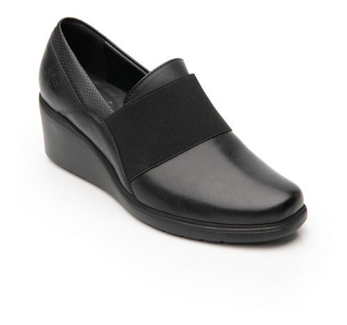 Zapato Flexi Jannis para mujer en color negro con banda elástica y cuña baja.