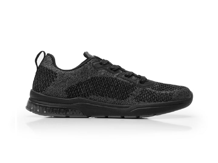 Tenis Flexi Casiopea para mujer en color negro con acabado tejido y suela deportiva.