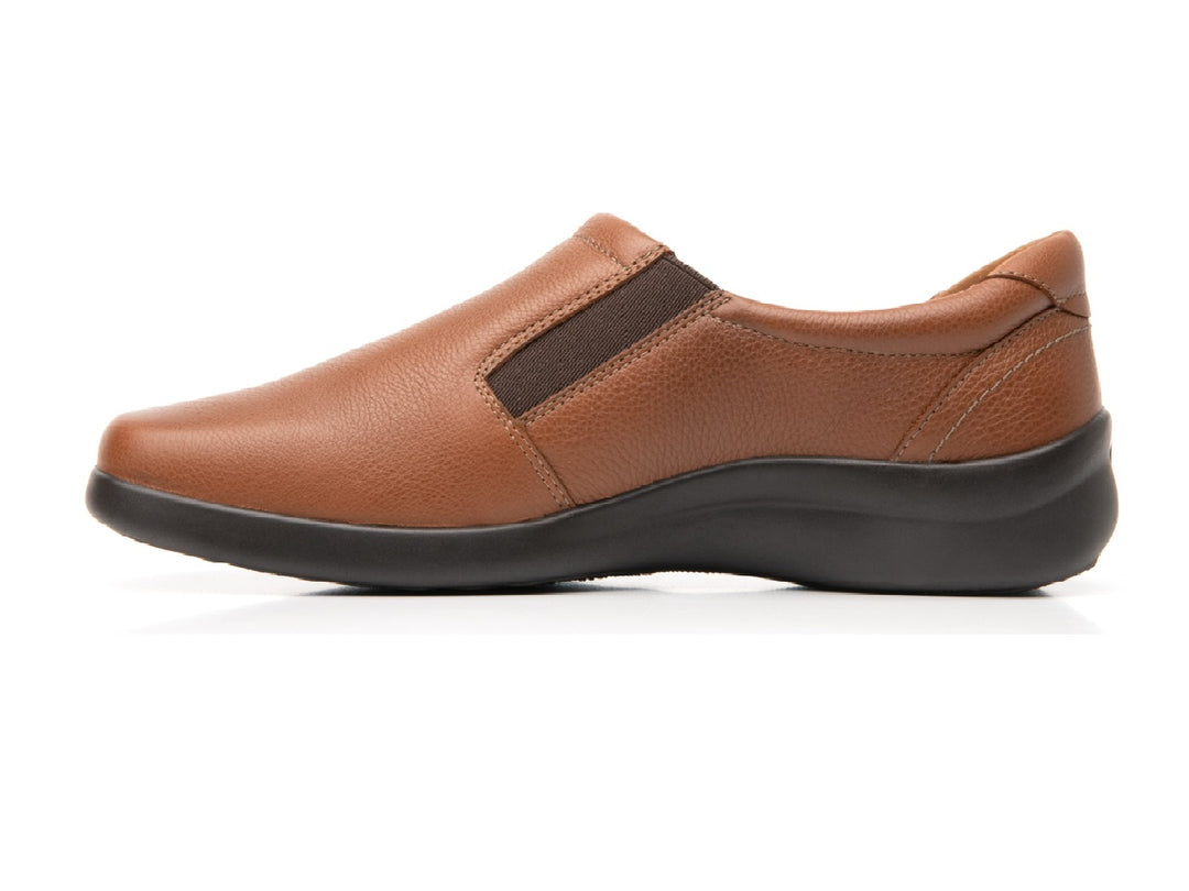 Zapato plano Flexi Ofelia para mujer en color tan con cierre lateral y suela negra.