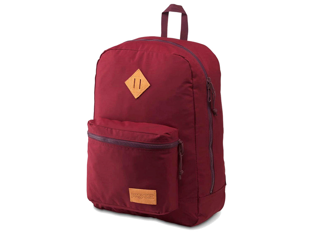 Mochila JanSport Super Lite color vino con un bolsillo frontal y detalle en cuero marrón.