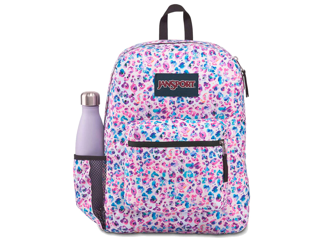 Mochila JanSport Cross Town con estampado multicolor de puntos tipo leopardo en tonos rosa, púrpura y azul.