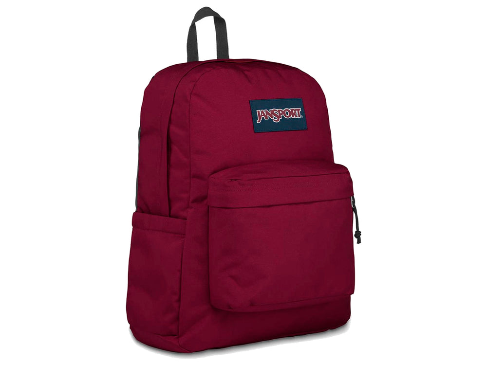 Mochila escolar JanSport color rojo russet con bolsillo frontal y asa superior.