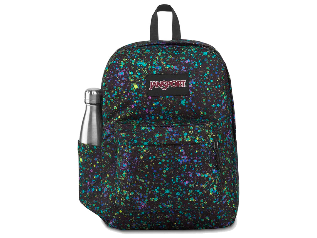 Mochila JanSport SuperBreak negra con estampado de salpicaduras en tonos azul, verde y morado.