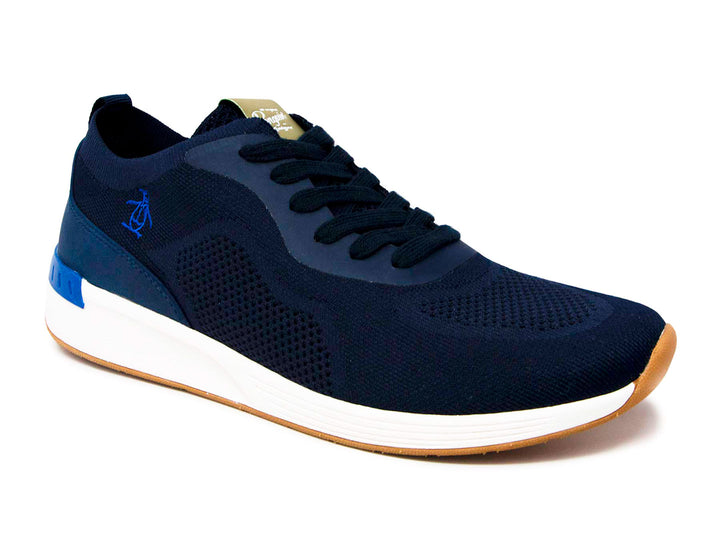 Tenis deportivos Penguin color azul marino con suela blanca y base color miel.