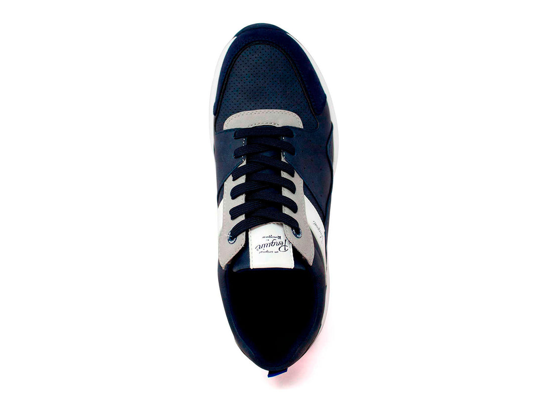 Tenis deportivos Penguin color azul marino con suela blanca y detalles en gris.