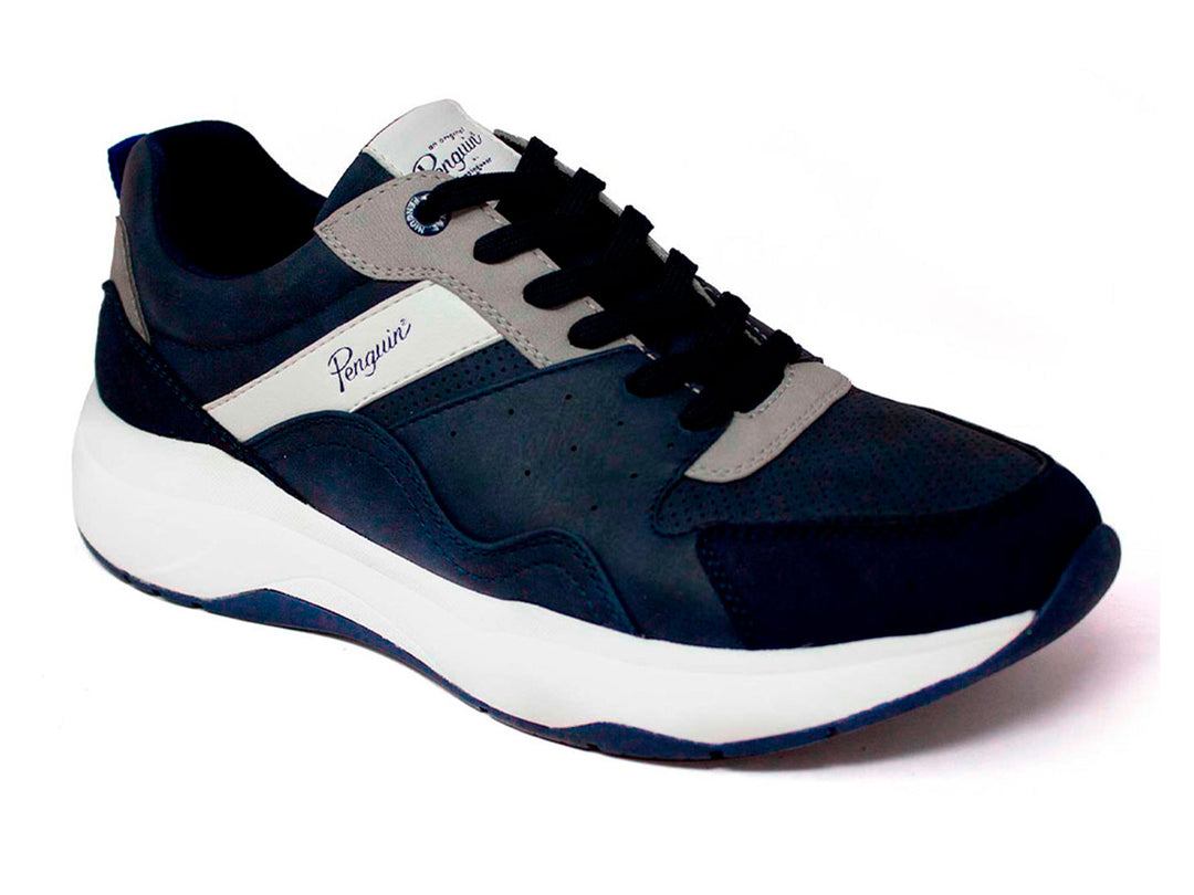 Tenis deportivos Penguin color azul marino con suela blanca y detalles en gris.