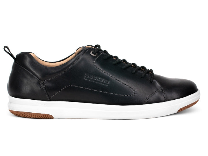 Tenis Dockers Malibu para hombre en color negro con suela blanca y marrón.