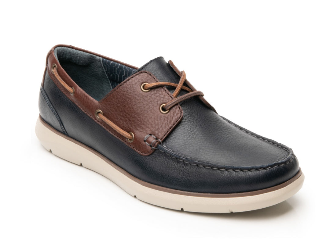 Zapato náutico Flexi para hombre en color azul marino y café con suela blanca.