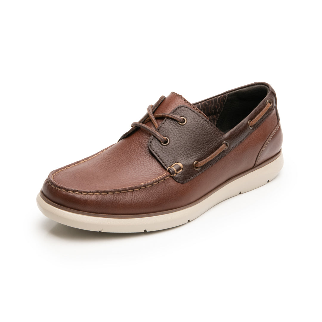Zapato náutico Flexi para hombre en cuero color marrón con suela blanca.
