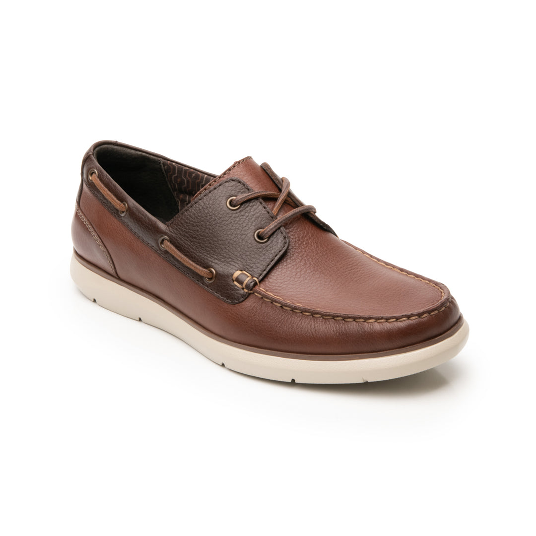Zapato náutico Flexi para hombre en cuero color marrón con suela blanca.