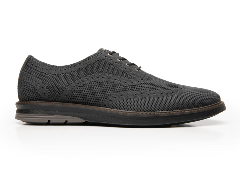 Zapato casual Flexi para hombre en color gris con tejido texturizado y cordones.