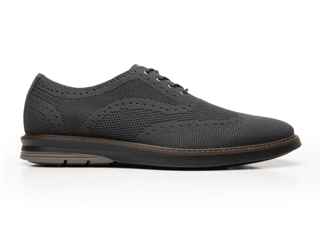 Zapato casual Flexi para hombre en color gris con tejido texturizado y cordones.