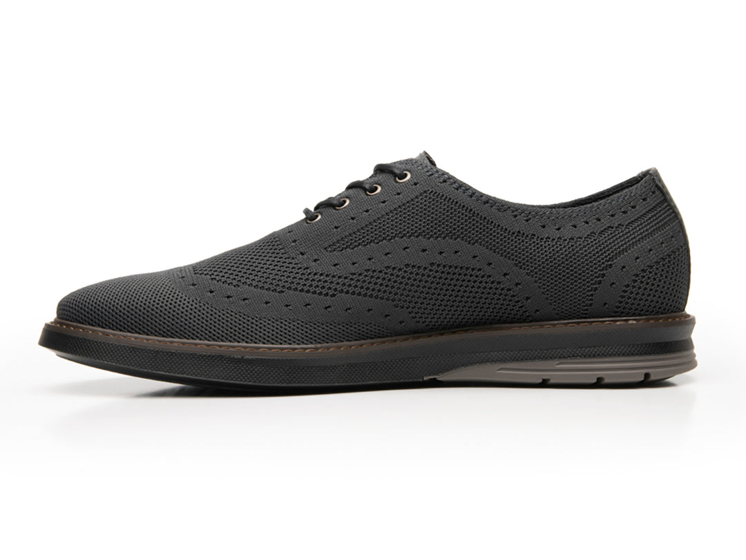 Zapato casual Flexi para hombre en color gris con tejido texturizado y cordones.