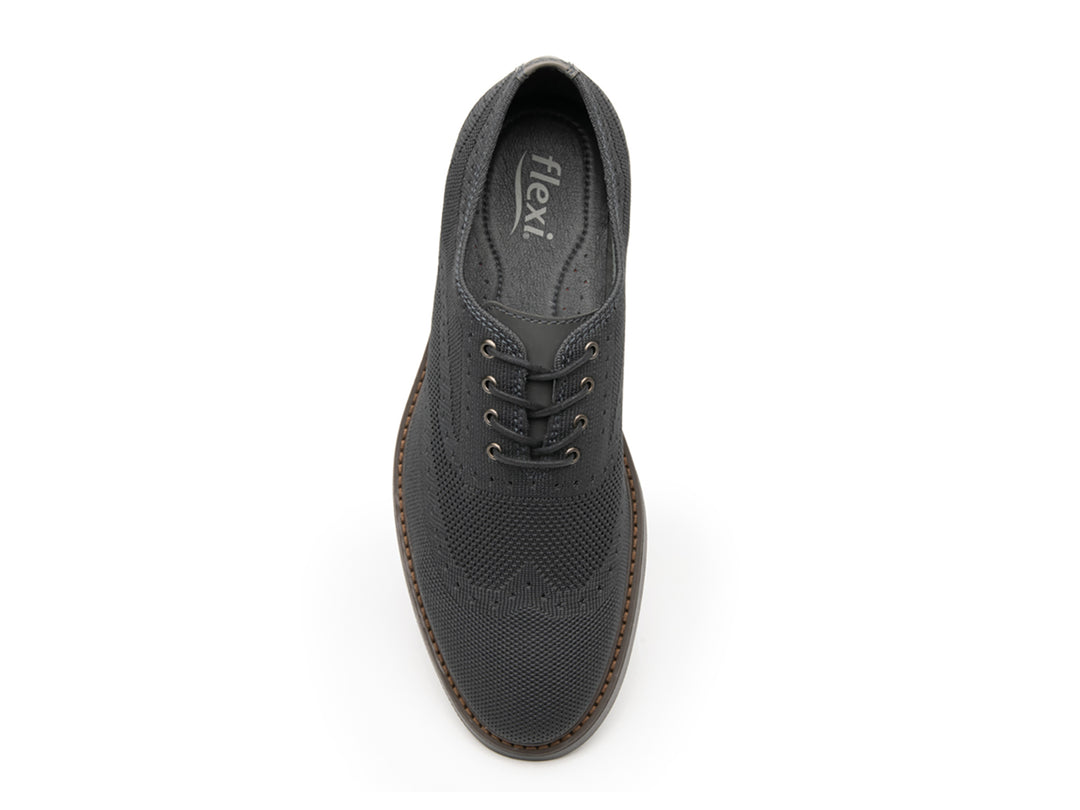 Zapato casual Flexi para hombre en color gris con tejido texturizado y cordones.
