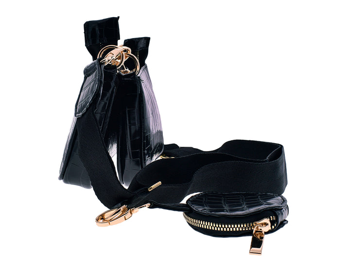 Set de tres bolsos Ferretina en color negro con textura tejida y detalles metálicos dorados.