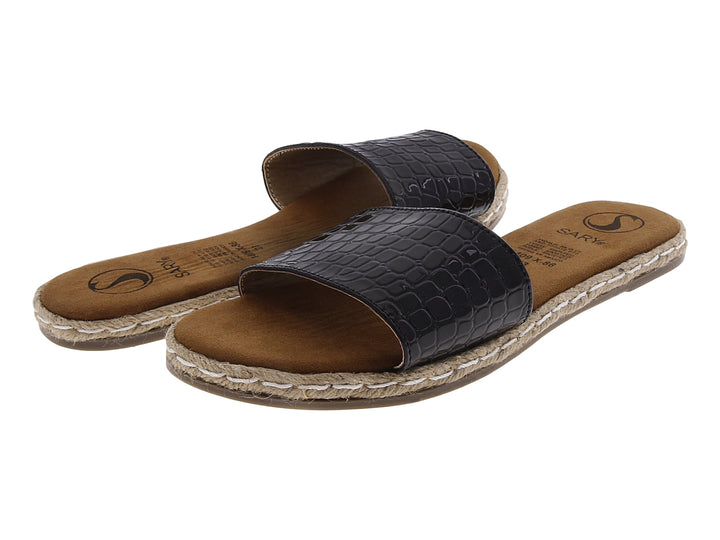 Sandalias casuales negras con textura de cocodrilo y suela color café con detalle de yute.