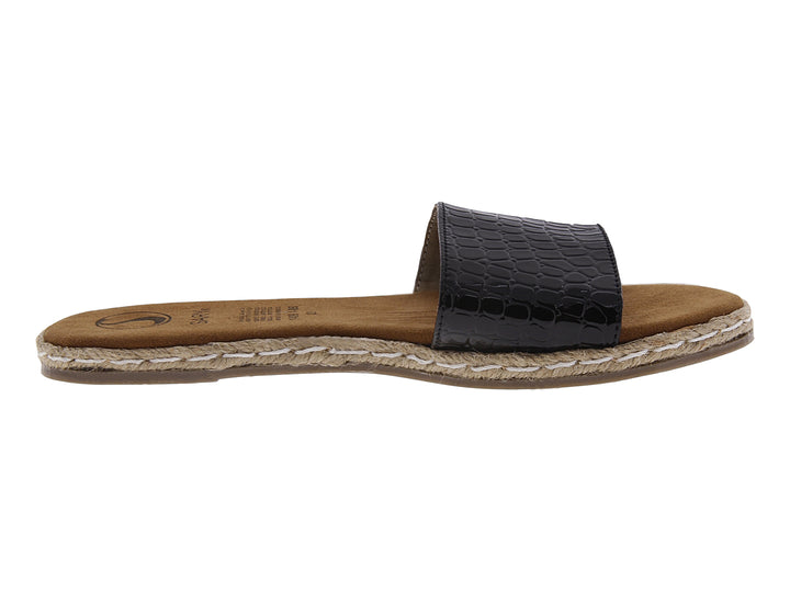 Sandalias casuales negras con textura de cocodrilo y suela color café con detalle de yute.