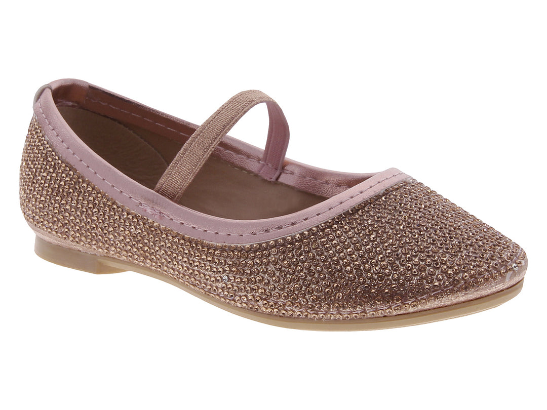 Zapatos planos para niña en color oro rosado con acabado brillante y correa superior.