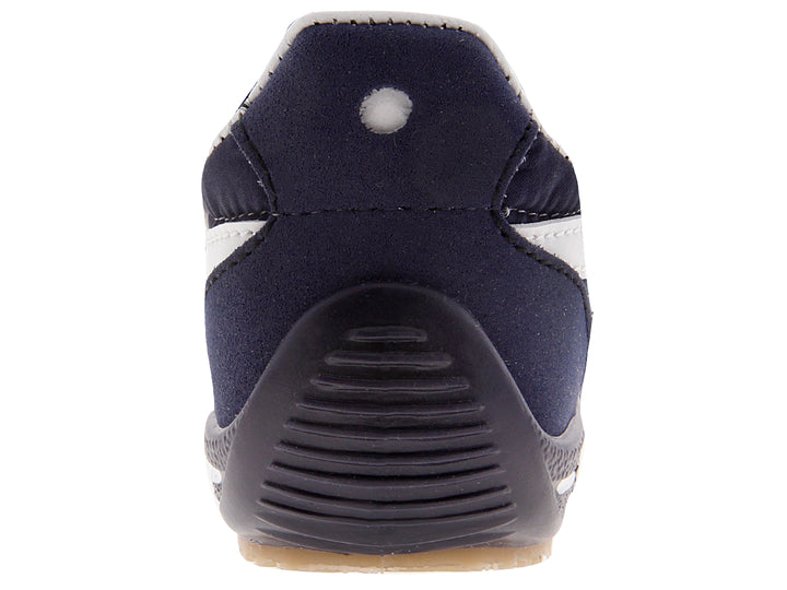 Tenis Panam para niño en color azul marino con detalles y agujetas blancas.