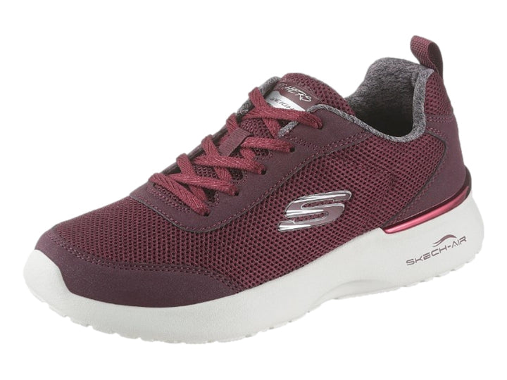 Tenis deportivos Skechers para Mujer en color burgundy con suela blanca.