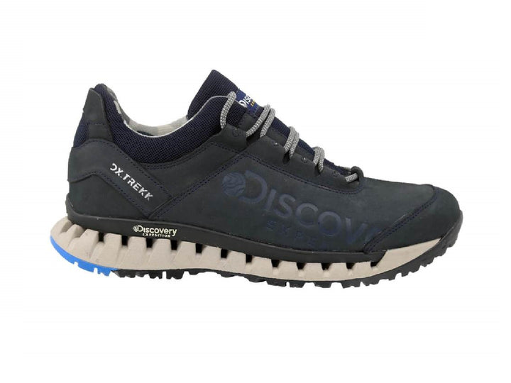 Zapato deportivo Discovery color azul marino con suela beige y detalles azules en la base.