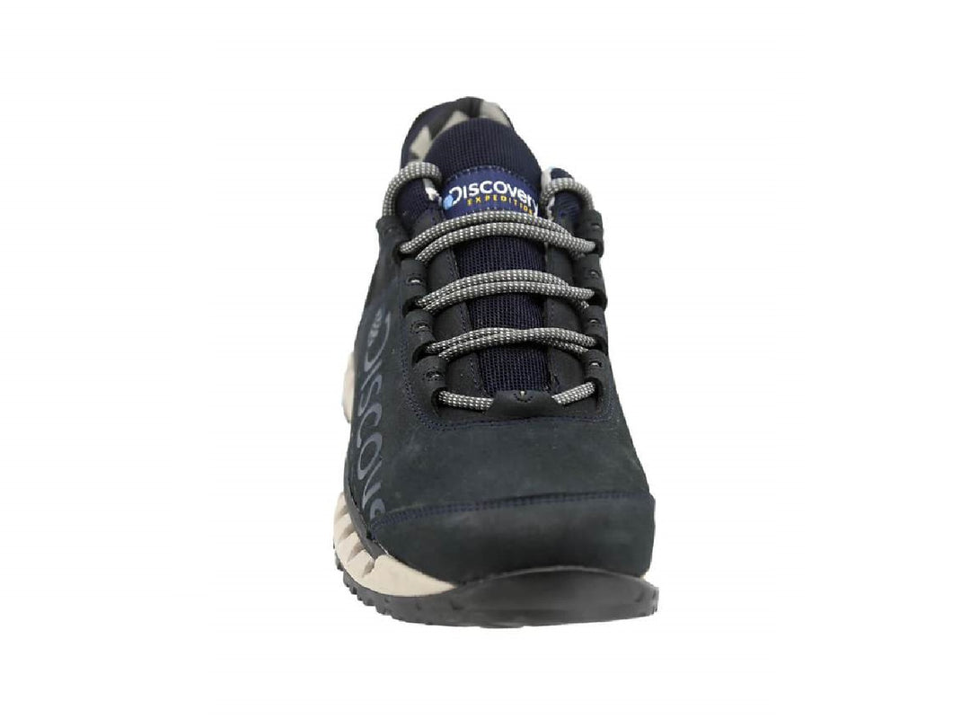 Zapato deportivo Discovery color azul marino con suela beige y detalles azules en la base.