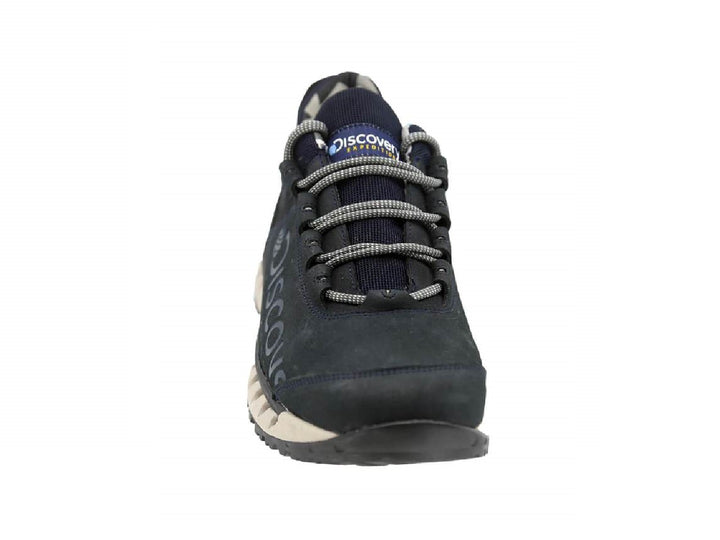 Zapato deportivo Discovery color azul marino con suela beige y detalles azules en la base.