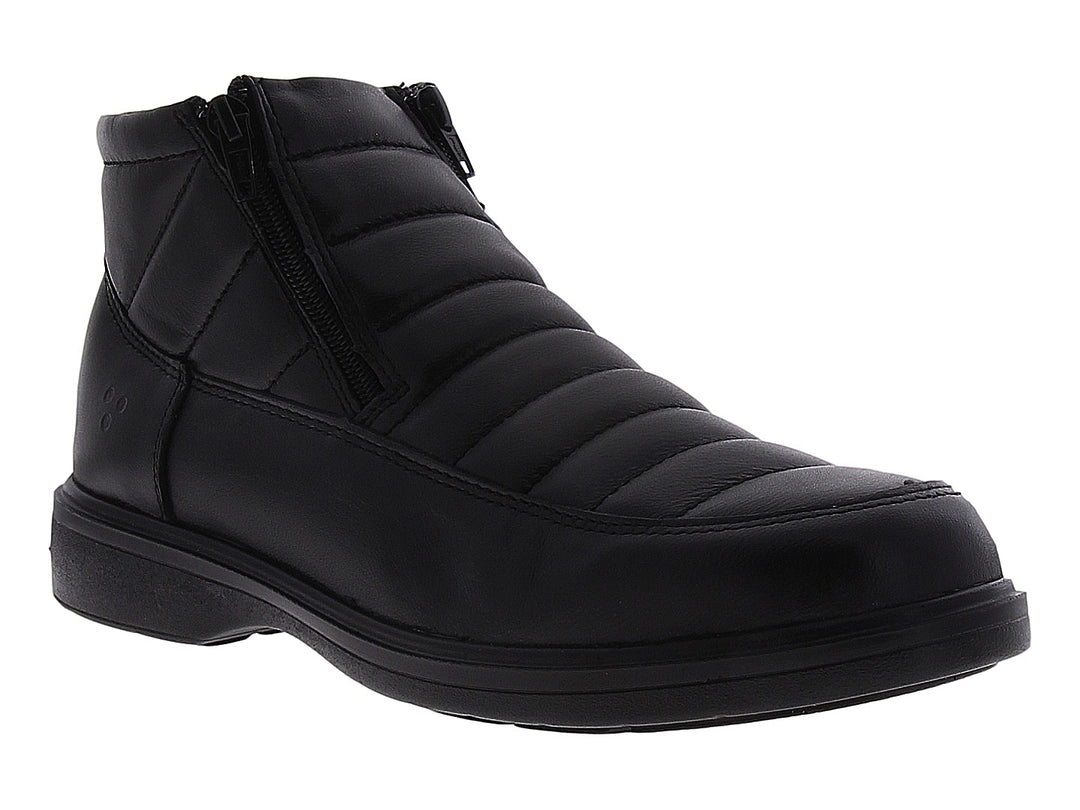 Botín negro para hombre con cierre lateral y diseño acolchado en la parte superior.