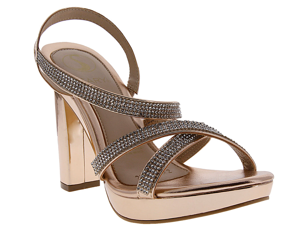 Sandalia de fiesta para mujer en color oro rosado con tacón bloque, plataforma y detalles de brillantes.