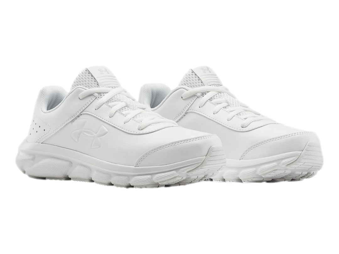 Tenis deportivos Under Armour de color blanco total con suela blanca y logotipo lateral.